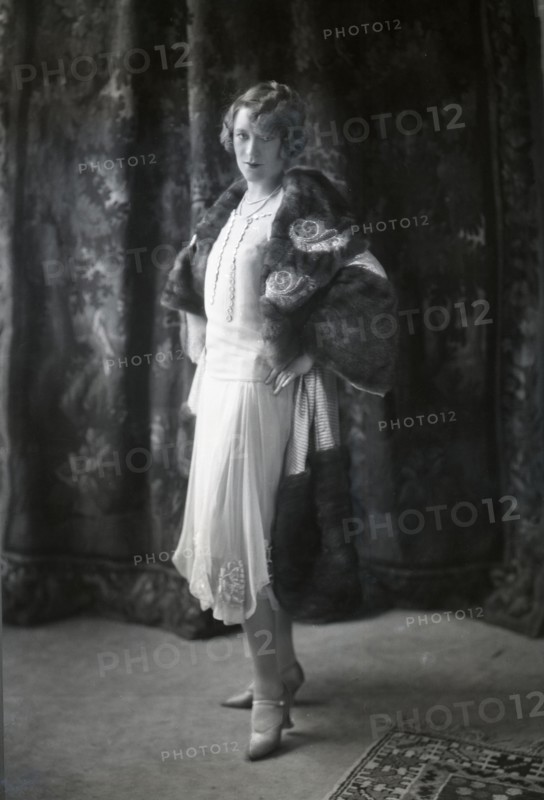 Annette Wills wearing a dress designed by Worth