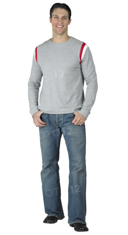 Casual guy with thumbs in his pockets.
