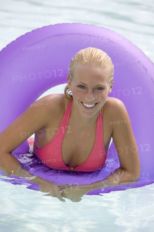 Young woman in a swimming pool.