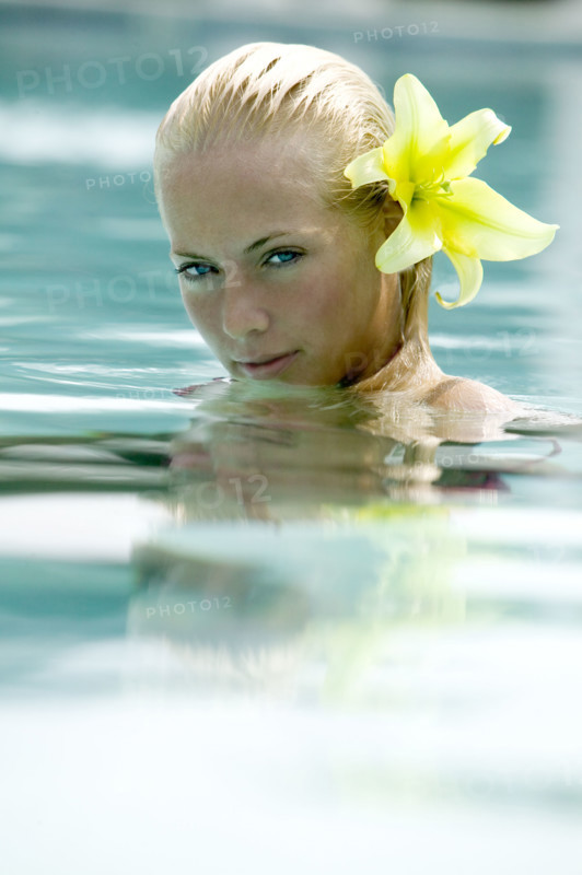 A submerged woman in a swimming pool.