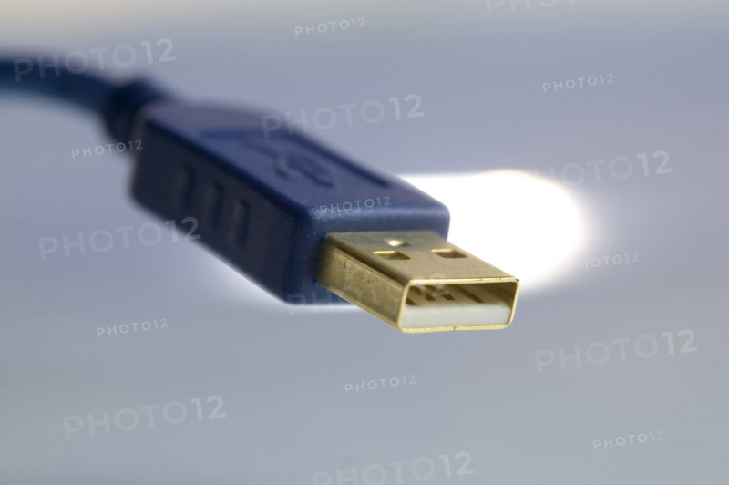 Closeup of a computer USB plug.