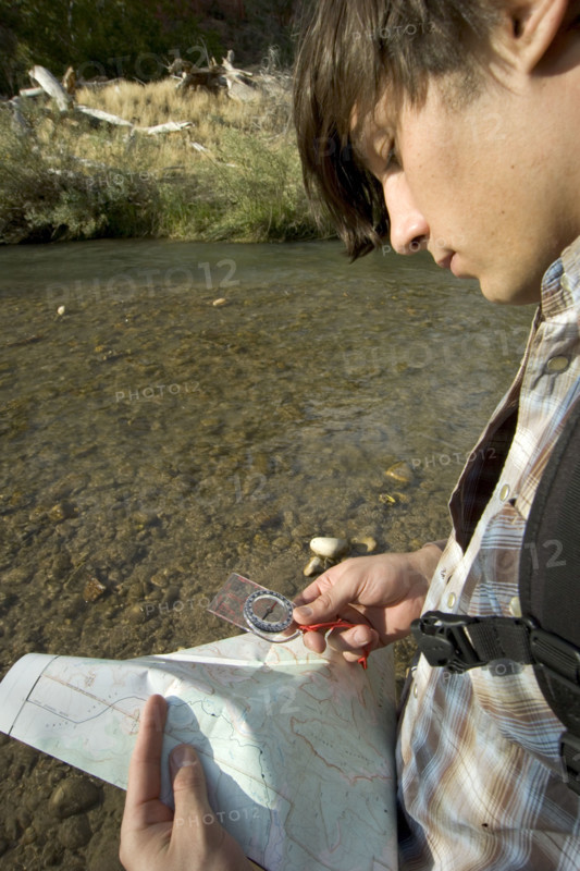 Hiker checking his map.