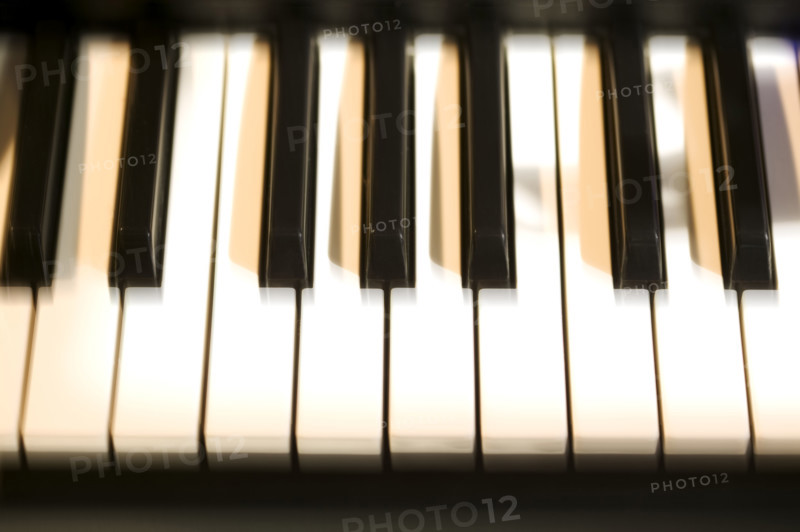 Closeup of piano keys.