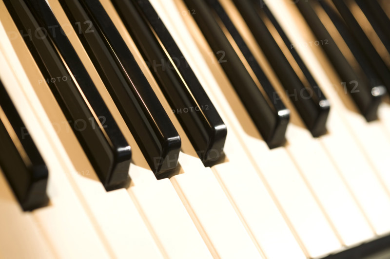 Closeup of piano keys.