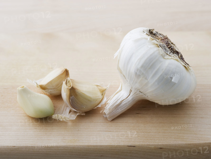 Closeup of garlic head and cloves.