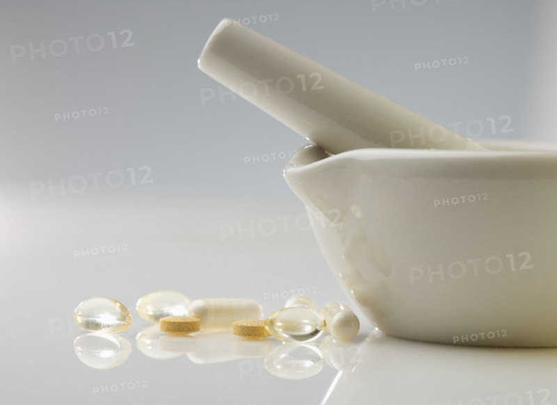 Pills with mortar and pestle.