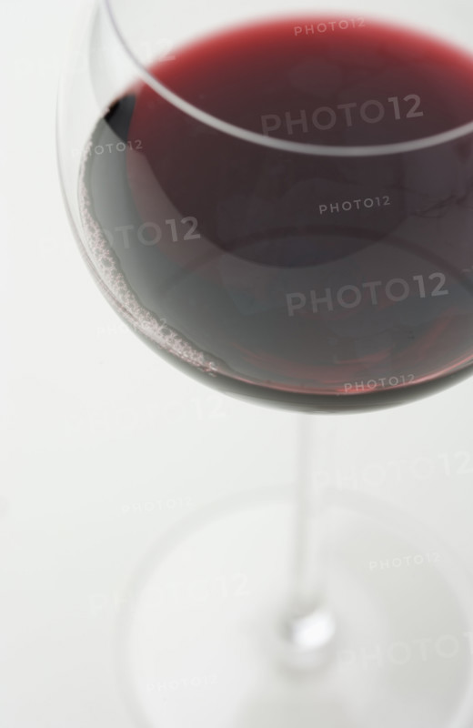 Closeup of glass of red wine.