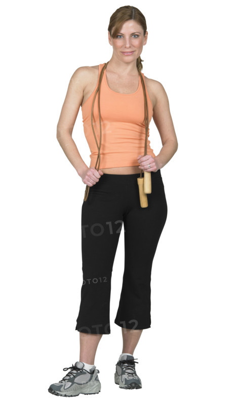 Young woman preparing to jump rope.