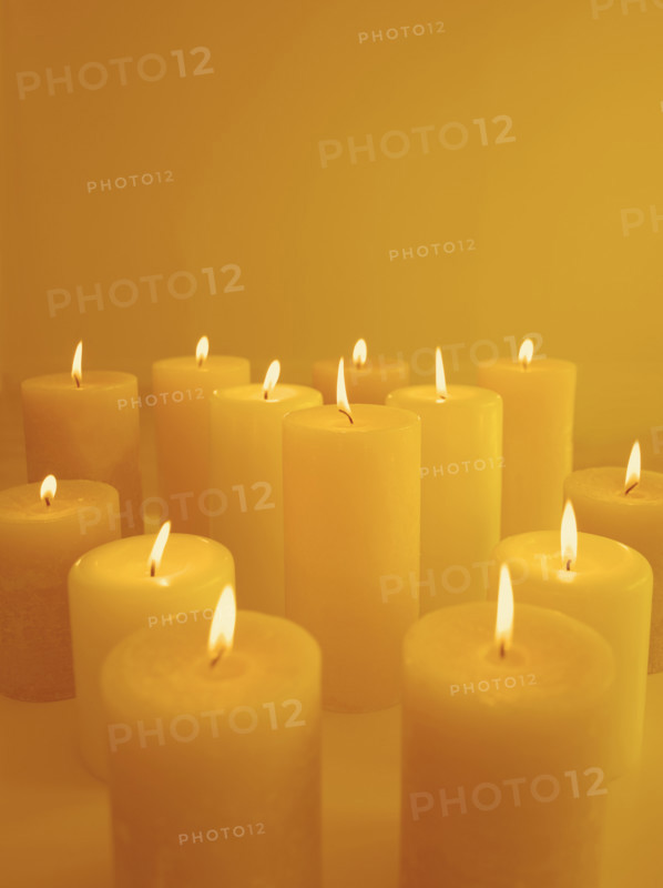 Still life of lighted candles.