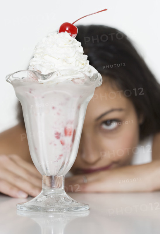 Woman wanting ice cream sundae.