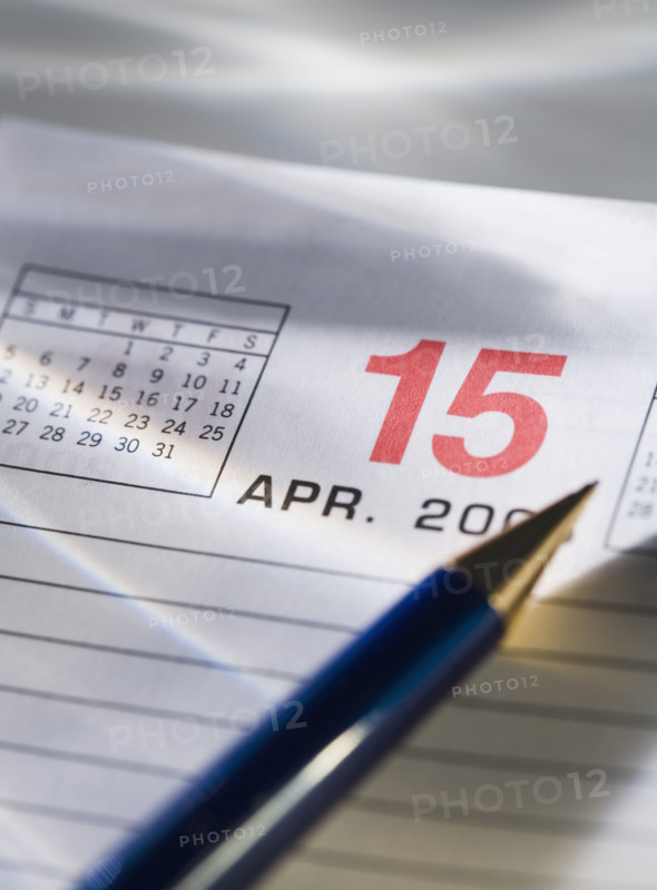Still life of calendar page of April 15.