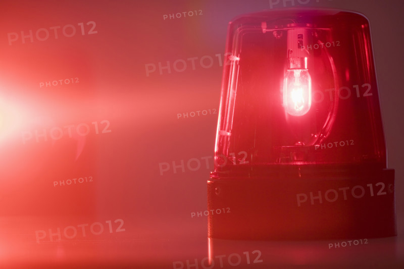 A glowing red emergency light.