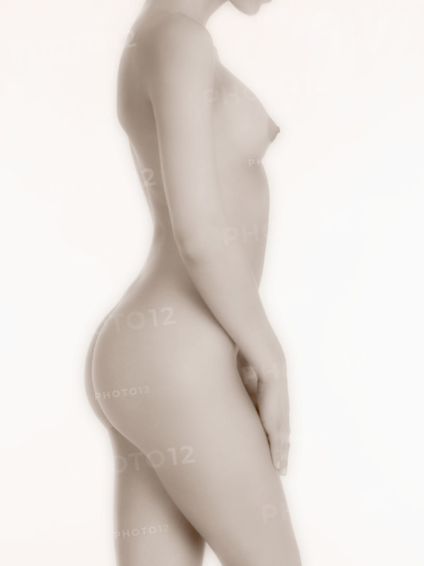 Nude woman in profile.