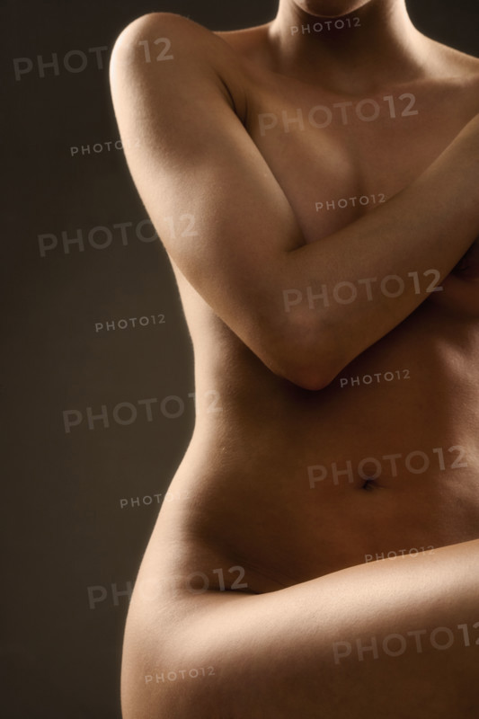 Front view of a nude female.