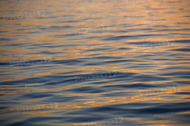 Subtle sunshine on water.