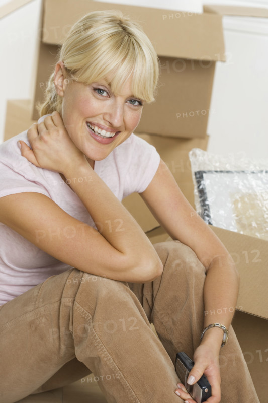 Portrait of woman on moving day.