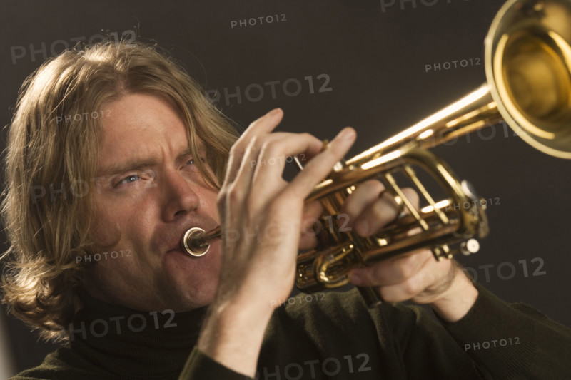 Man playing the trumpet.