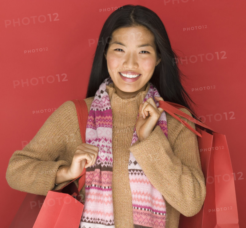 Young woman with shopping bags.