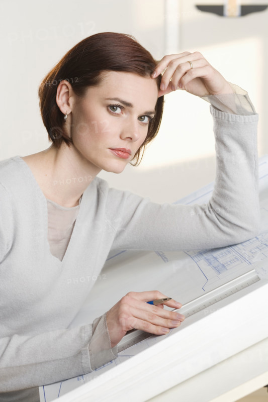 Portrait of woman at drawing board.