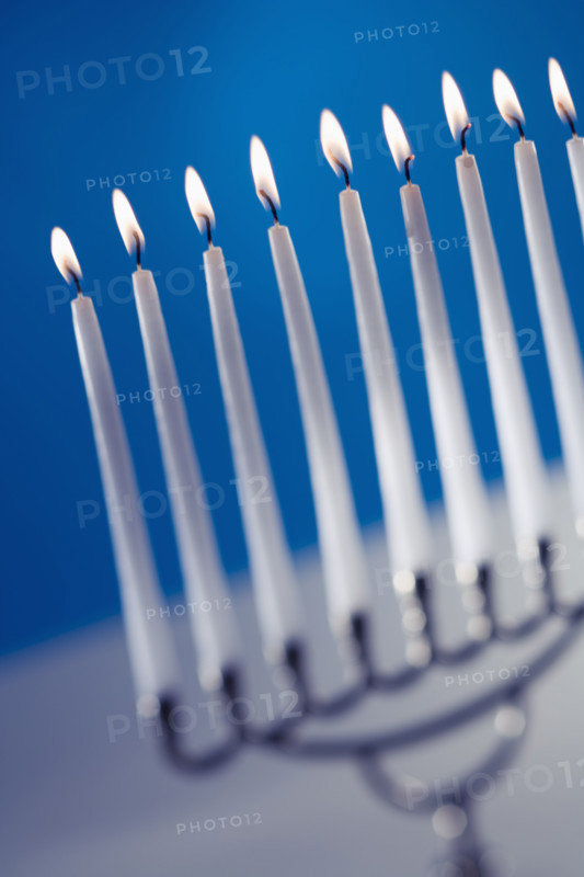 A fully lit menorah.