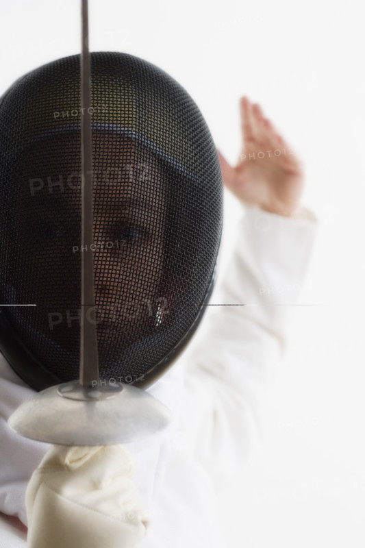Closeup of a fencer.