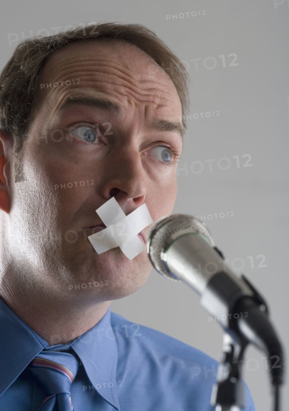 Man prevented from speaking.