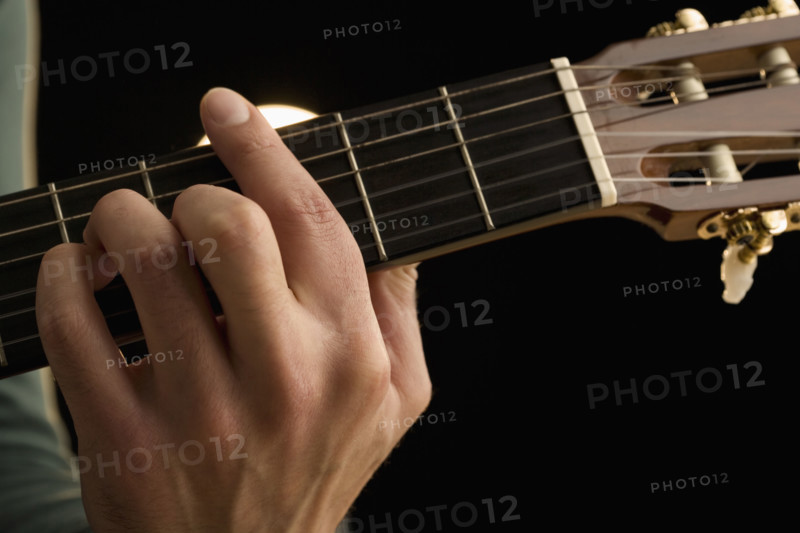 Man playing guitar.