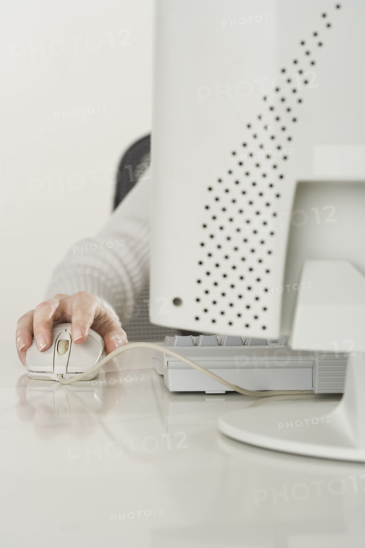 Woman working at computer.