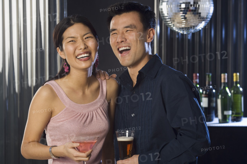 Couple having drinks in a bar.