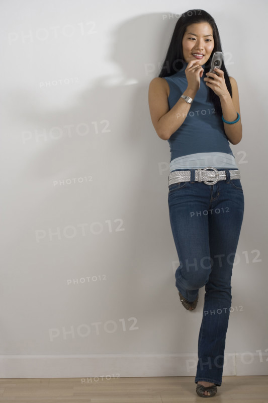 Young woman using a mobile phone.