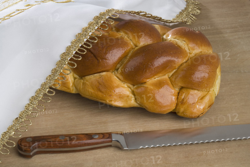 Closeup of a loaf of challah bread.