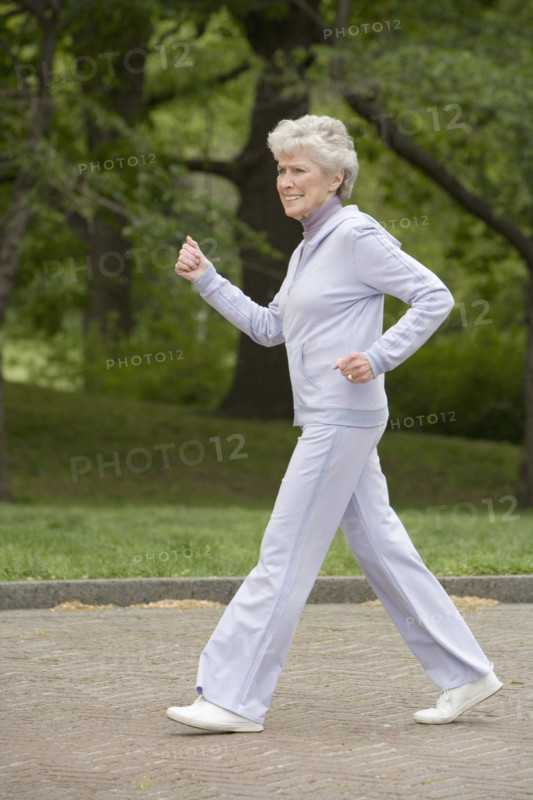 Senior woman power walking.