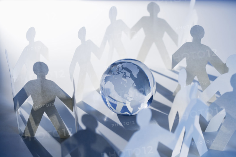 Chain of paperdoll cutouts with globe in center.