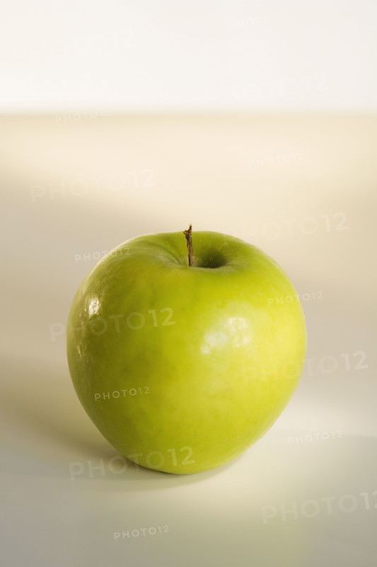 Close up of apple on table.