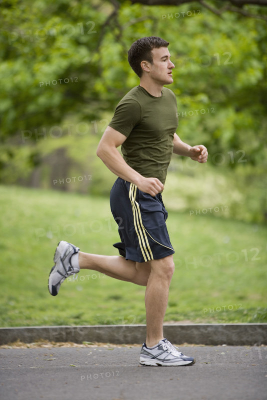 Man jogging in park.