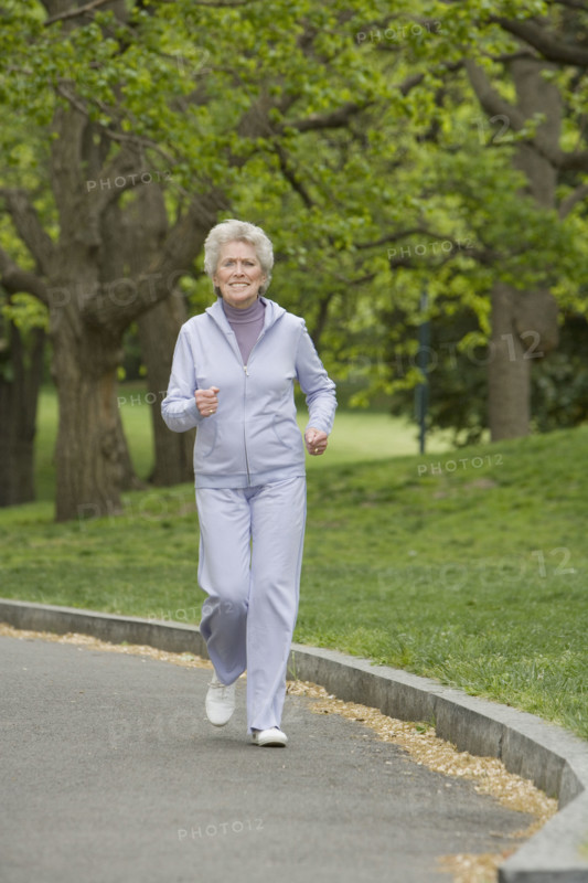 Senior woman power walking.