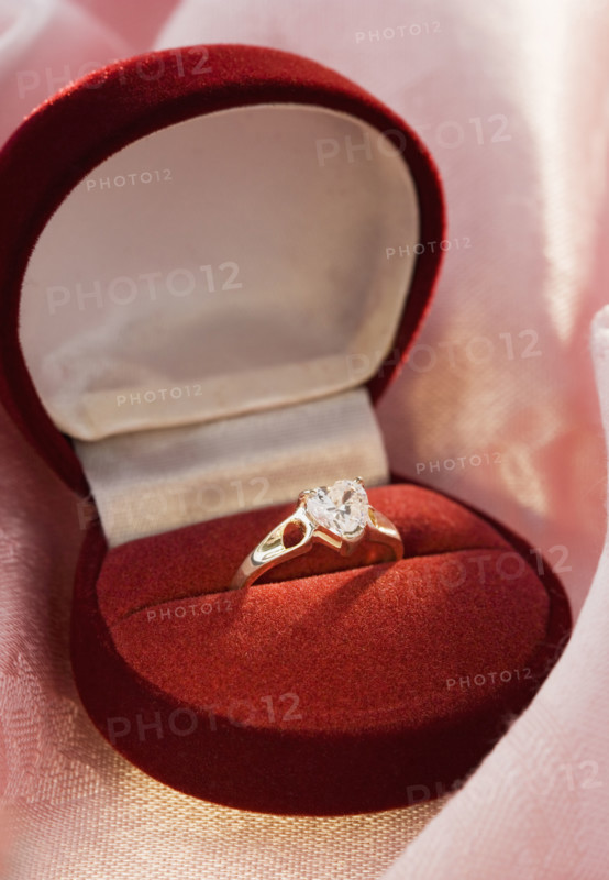 Still life of diamond engagement ring.