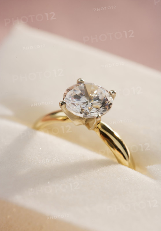 Closeup of a diamond engagement ring.