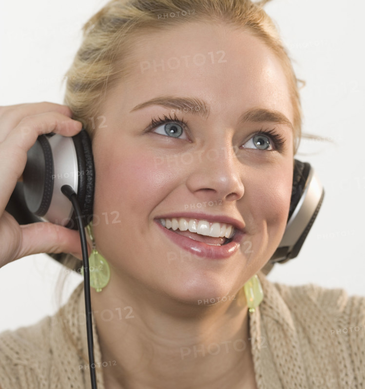 Young woman wearing headphones.