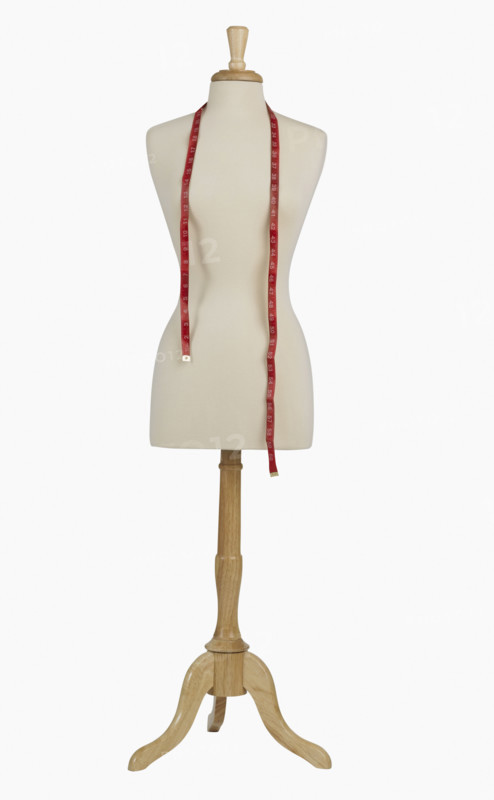 Studio shot of dress dummy and tape measure.