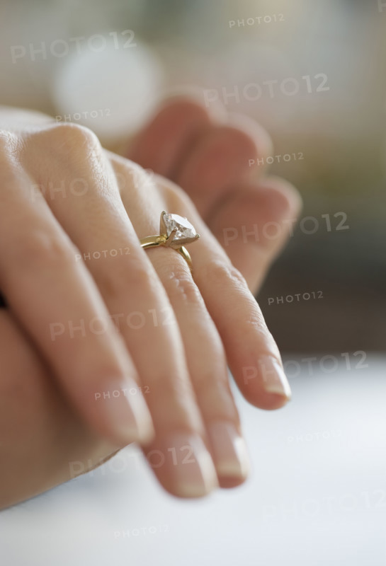Close up of diamond engagement ring.