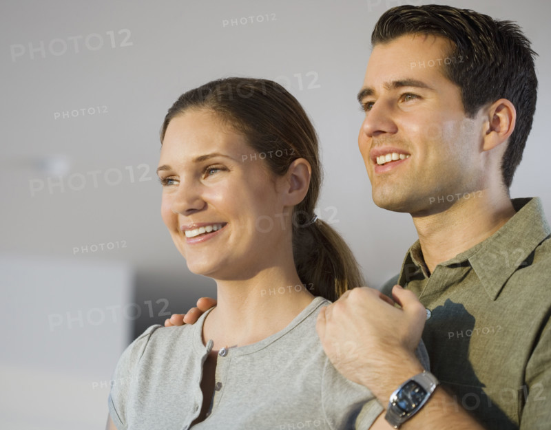Close up of couple smiling.