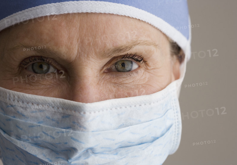 Close up of female doctor wearing surgical mask.