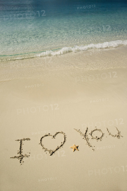 I Love You written in sand.
