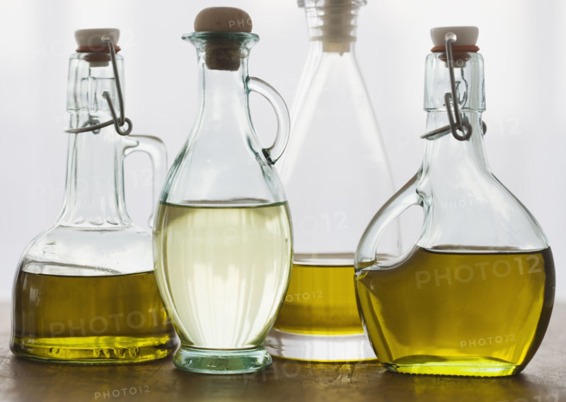Assorted bottles of oil.