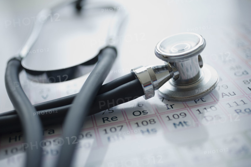 Close up of stethoscope on periodic chart.