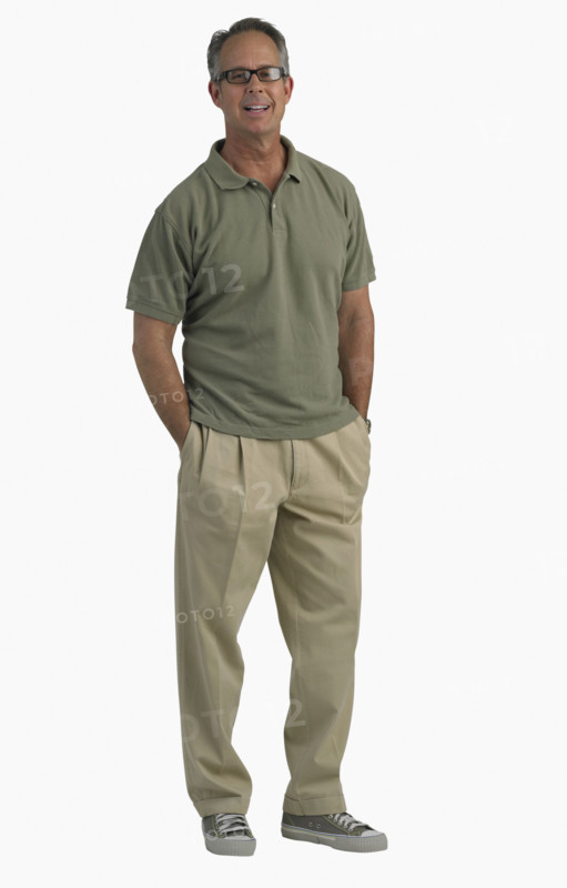 Studio shot of man with hands in pockets.