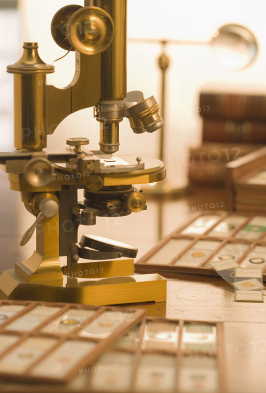 Old fashioned microscope and slides.