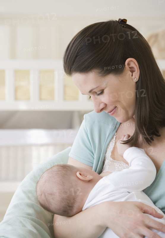 Mother breastfeeding baby.