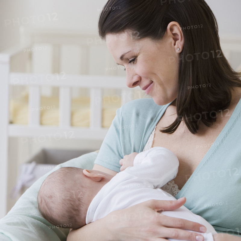Mother breastfeeding baby.